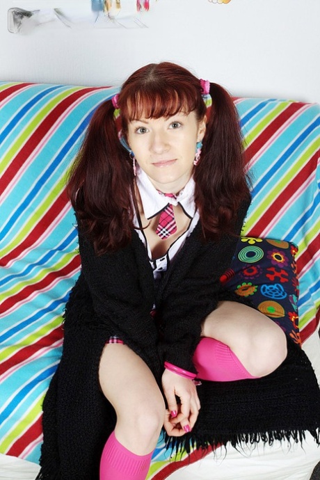Young looking redhead Selena has sexual intercourse with a Panda 38130232