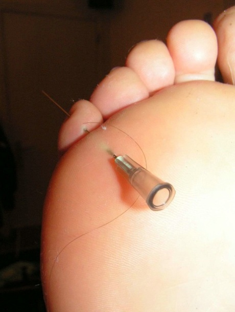 Naked blond is tortured with needles and electricity while in bondage 48329684