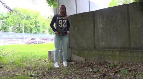 Caucasian girl Naomi Bennet ducks behind a concrete wall for a much needed pee 42465089