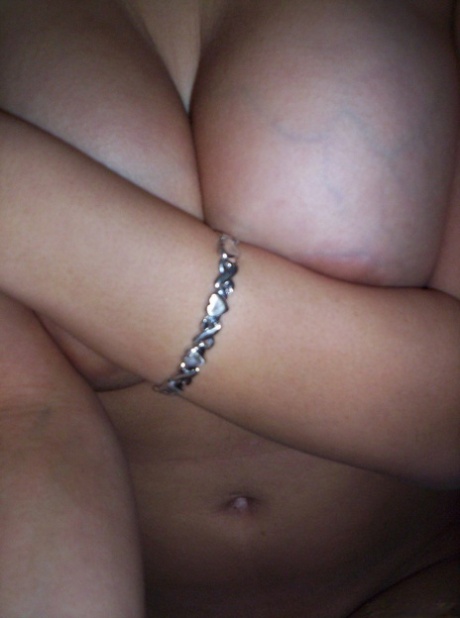 Brunette teen Nikki takes tempting safe for work self shots while undressing 93257590