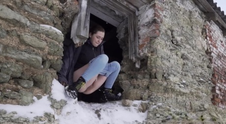Nice girl shows her bare ass while taking a piss on snow-covered ground 32700029