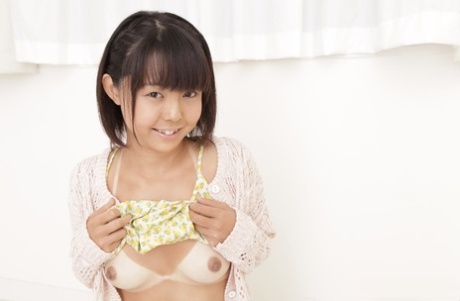 Cute Japanese girl Tomoyo Isumi exposes her tan lined body 25173171