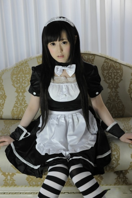 Cute Japanese maid Machiko Ono stretches out her tight slit during solo action 67059352